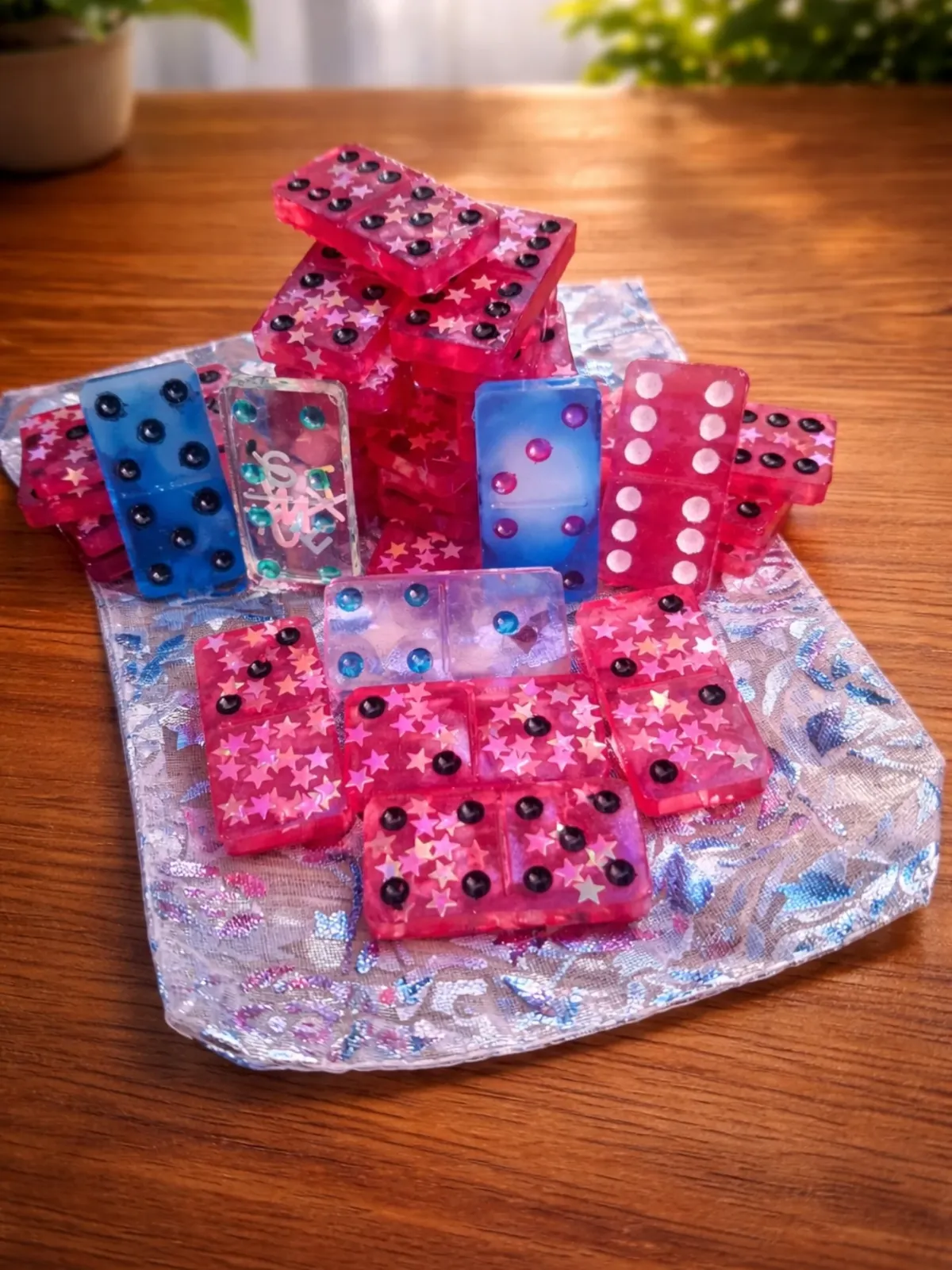 Freshly demoulded pink and blue resin dominoes